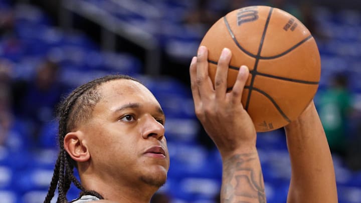 Apr 27, 2025; Orlando, Florida, USA; Orlando Magic forward Paolo Banchero (5) warms up before game four of first round for the 2025 NBA Playoffs against the Boston Celtics at Kia Center. Mandatory Credit: Nathan Ray Seebeck-Imagn Images