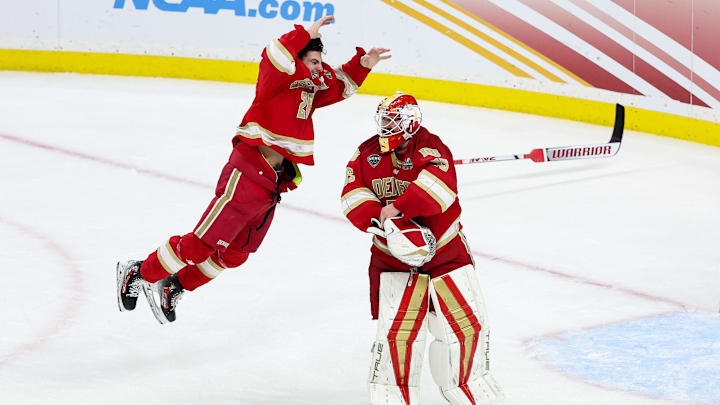 Apr 13, 2024; Saint Paul, Minnesota, USA; Denver Pioneers defenseman Zeev Buium (28) and goaltender Matt Davis (35) celebrate their teams win against the Boston College Eagles after the championship game of the 2024 Frozen Four college ice hockey tournament at Xcel Energy Center. Mandatory Credit: Matt Krohn-Imagn Images Apr 13, 2024; Saint Paul, Minnesota, USA; Denver Pioneers defenseman Zeev Buium (28) and goaltender Matt Davis (35) celebrate their teams win against the Boston College Eagles after the championship game of the 2024 Frozen Four college ice hockey tournament at Xcel Energy Center. Mandatory Credit: Matt Krohn-Imagn Images