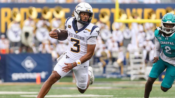 Sep 5, 2026; Morgantown, West Virginia, USA;  West Virginia Mountaineers quarterback Michael Hawkins Jr. (3) runs the ball during the second quarter against the Coastal Carolina Chanticleers at Milan Puskar Stadium.  Mandatory Credit: Ben Queen-Imagn Images