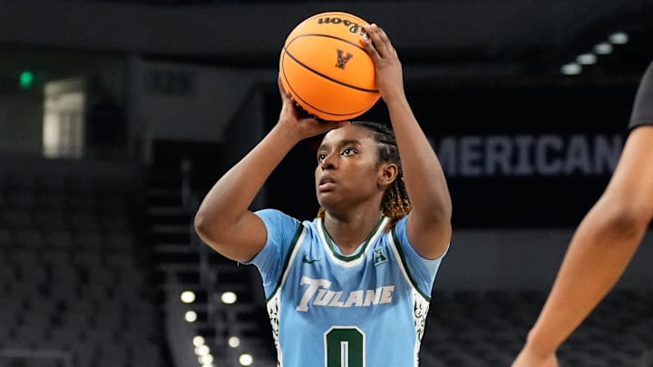 Mar 6, 2023; Fort Worth, TX, USA; Tulane Green Wave guard Kyren Whittington (0) scores a basket against the Cincinnati Bearcats during the first half at Dickies Arena. 