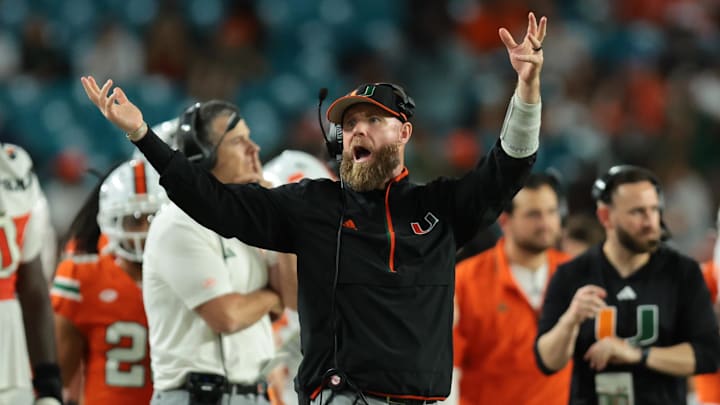 Nov 15, 2025; Miami Gardens, Florida, USA; against the Miami Hurricanes defensive coordinator Corey Hetherman reacts on the sideline against NC State Wolfpack during the fourth quarter at Hard Rock Stadium. Mandatory Credit: Sam Navarro-Imagn Images Nov 15, 2025; Miami Gardens, Florida, USA; against the Miami Hurricanes defensive coordinator Corey Hetherman reacts on the sideline against NC State Wolfpack during the fourth quarter at Hard Rock Stadium. Mandatory Credit: Sam Navarro-Imagn Images