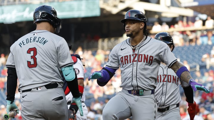 Jun 18, 2024; Washington, District of Columbia, USA; Arizona Diamondbacks second baseman Ketel Marte (4) celebrates with Diamondbacks designated hitter Joc Pederson (3) after rounding the bases after hitting a two run home run against the Washington Nationals during the first inning during the first inning at Nationals Park. Mandatory Credit: Geoff Burke-USA TODAY Sports