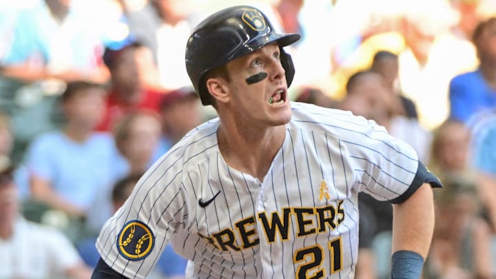Milwaukee Brewers left fielder Mark Canha (21) watches one fly to right field. Milwaukee Brewers left fielder Mark Canha (21) watches one fly to right field.