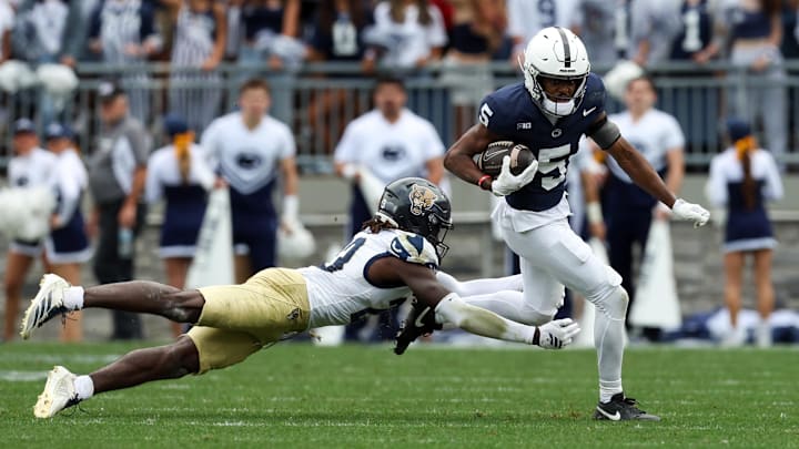 Penn State Nittany Lions wide receiver Devonte Ross (5) runs against FIU Panthers defensive back Jessiah McGrew (23) during the second quarter at Beaver Stadium. Penn State Nittany Lions wide receiver Devonte Ross (5) runs against FIU Panthers defensive back Jessiah McGrew (23) during the second quarter at Beaver Stadium.