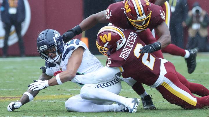 Sep 27, 2026; Landover, Maryland, USA; Seattle Seahawks wide receiver Jaxon Smith-Njigba (11) attempts to make a catch against Washington Commanders cornerback Amik Robertson (2) at Northwest Stadium. Mandatory Credit: Amber Searls-Imagn Images Sep 27, 2026; Landover, Maryland, USA; Seattle Seahawks wide receiver Jaxon Smith-Njigba (11) attempts to make a catch against Washington Commanders cornerback Amik Robertson (2) at Northwest Stadium. Mandatory Credit: Amber Searls-Imagn Images