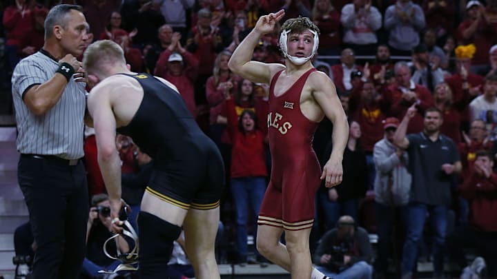 Iowa State Cyclones Casey Swiderski celebrates after winning over Iowa Hawkeyes Victor Voinovich during their 149-pound wrestling at Hilton Coliseum on Sunday, Nov. 26, 2023, in Ames, Iowa. Iowa State Cyclones Casey Swiderski celebrates after winning over Iowa Hawkeyes Victor Voinovich during their 149-pound wrestling at Hilton Coliseum on Sunday, Nov. 26, 2023, in Ames, Iowa.