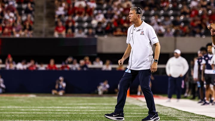 Aug 30, 2025; Tucson, Arizona, USA; Arizona Wildcats head coach Brent Brennan watches the game from the sidelines during the first quarter against the Hawaii Rainbow Warriors at Arizona Stadium. Mandatory Credit: Aryanna Frank-Imagn Images