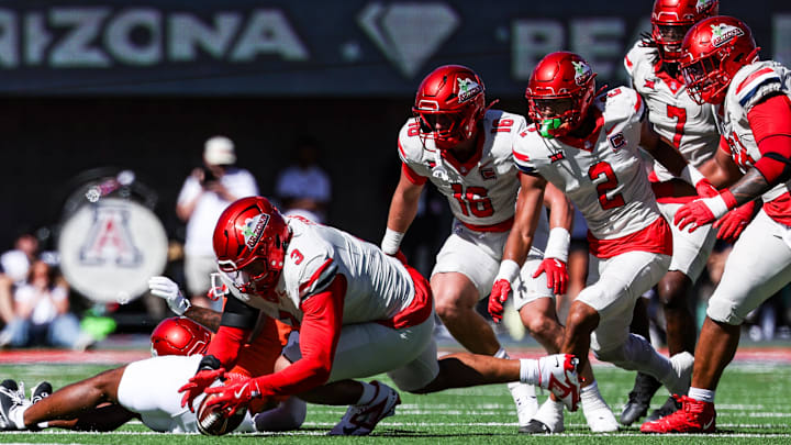 Oct 4, 2025; Tucson, Arizona, USA; Arizona Wildcats running back Kedrick Reescano (3) recovers a fumble during the third quarter of the game against the Oklahoma State Cowboys at Arizona Stadium. Mandatory Credit: Aryanna Frank-Imagn Images Oct 4, 2025; Tucson, Arizona, USA; Arizona Wildcats running back Kedrick Reescano (3) recovers a fumble during the third quarter of the game against the Oklahoma State Cowboys at Arizona Stadium. Mandatory Credit: Aryanna Frank-Imagn Images