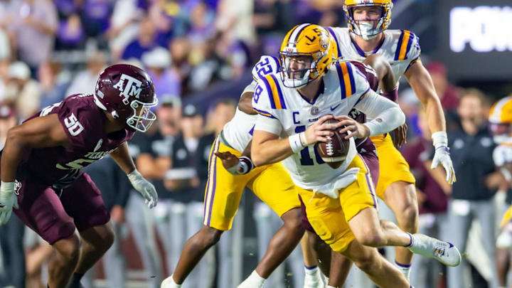 Tigers Quarterback Garrett Nussmeier 18 scrambles and is sacked by Linebacker Jaiden Bracker 15 as LSU Tigers take on the Texas A&M Aggies. October 25, 2025; Baton Rouge, Louisiana, USA; at Tiger Stadium. Saturday, Oct. 25, 2025. Tigers Quarterback Garrett Nussmeier 18 scrambles and is sacked by Linebacker Jaiden Bracker 15 as LSU Tigers take on the Texas A&M Aggies. October 25, 2025; Baton Rouge, Louisiana, USA; at Tiger Stadium. Saturday, Oct. 25, 2025.