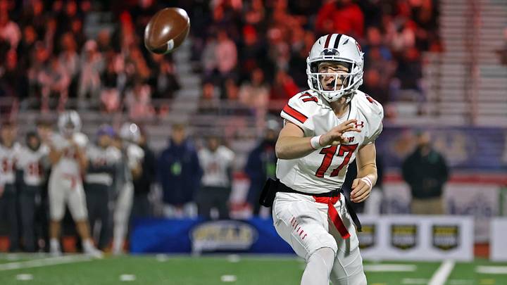 Peters Township quarterback Nolan DiLuca flips the ball to his running back during the 2023 PIAA Class 5A state championship game. Peters Township quarterback Nolan DiLuca flips the ball to his running back during the 2023 PIAA Class 5A state championship game.
