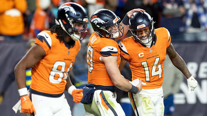December 15, 2024, Denver, Colorado, USA: Denver Broncos quarterback Bo Nix (10) and wide receiver Courtland Sutton (14) celebrate a score.