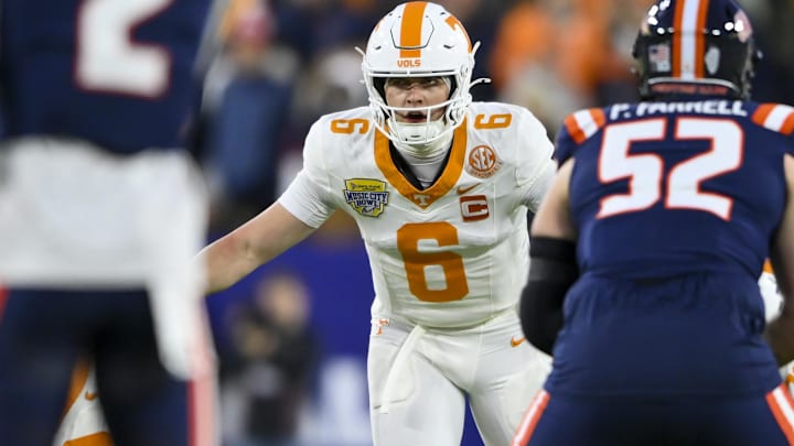 Dec 30, 2025; Nashville, TN, USA; Tennessee Volunteers quarterback Joey Aguilar (6) changes the play against the Illinois Fighting Illini during the first half at Nissan Stadium. Mandatory Credit: Steve Roberts-Imagn Images