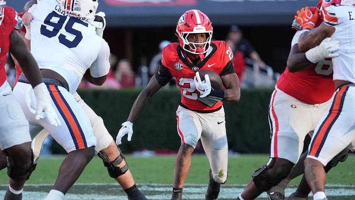 Oct 17, 2026; Athens, Georgia, USA;  Georgia running back Dwight Phillips Jr. (20) runs for a gain during the third quarter against Auburn at Sanford Stadium.  Mandatory Credit: Dale Zanine-Imagn Images