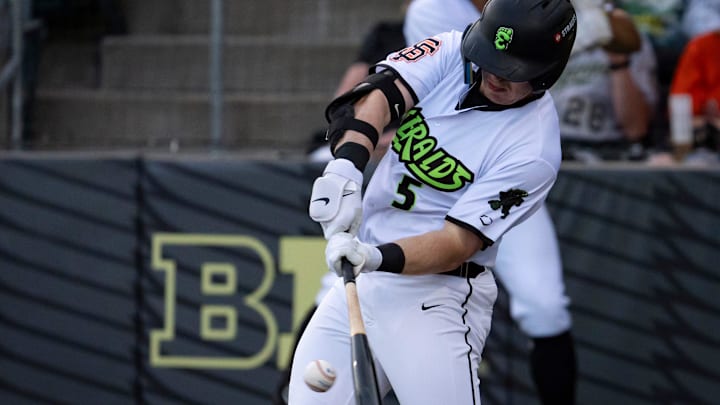 James Tibbs III hits a single for the Emeralds during the Eugene Emeralds home opener Wednesday, April 9, 2025, at PK Park in Eugene, Ore.