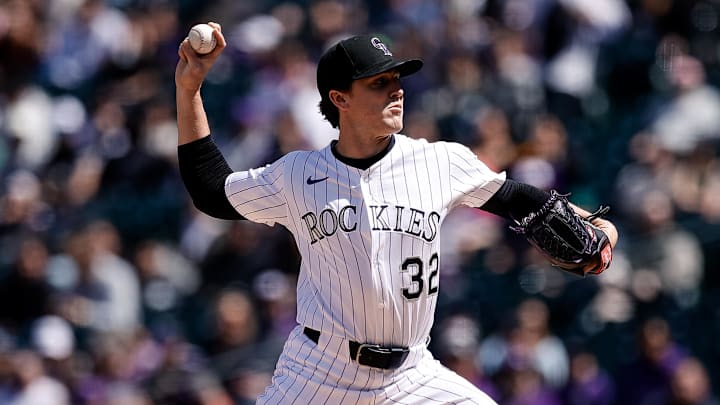 Apr 6, 2025; Denver, Colorado, USA; Colorado Rockies starting pitcher Chase Dollander (32) pitches in the first inning against the Athletics at Coors Field. Mandatory Credit: Isaiah J. Downing-Imagn Images