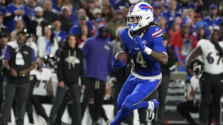 Buffalo Bills running back James Cook runs the ball against the Baltimore Ravens.