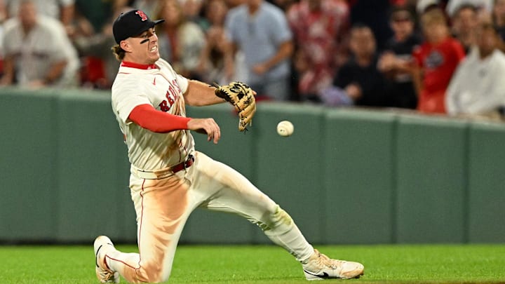 Sep 14, 2025; Boston, Massachusetts, USA; Boston Red Sox second baseman Romy Gonzalez (23) throws to first base for an out against the New York Yankees during the ninth inning at Fenway Park. Mandatory Credit: Brian Fluharty-Imagn Images