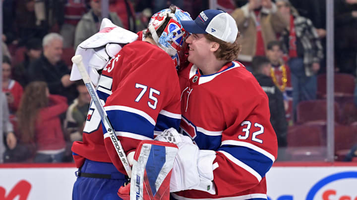 Mar 26, 2026; Montreal, Quebec, CAN; Montreal Canadiens goalie Jakub Dobes (75) celebrates the win against the Columbus Blue Jackets with teammate goalie Jacob Fowler (32) at the Bell Centre. Mandatory Credit: Eric Bolte-Imagn Images