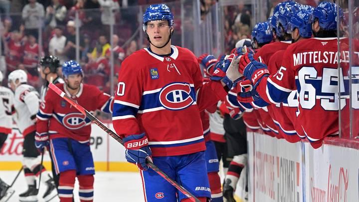 Sep 26, 2026; Montreal, Quebec, CAN;  Montreal Canadiens forward Juraj Slafkovsky (20) celebrates with teammates after scoring a goal against the Ottawa Senators during the third period at the Bell Centre.  Mandatory Credit: Eric Bolte-Imagn Images
