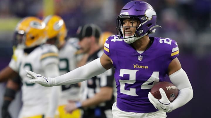 Minnesota Vikings safety Camryn Bynum (24) celebrates recovering a fumble by Green Bay Packers running back Josh Jacobs (8) in the first quarter during their football game Sunday, December 29, 2024, at U.S. Bank Stadium in Minneapolis, Minnesota.
