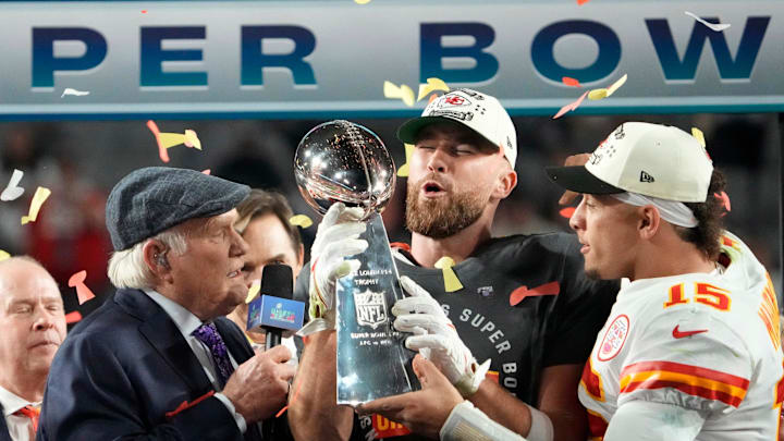 Super Bowl 57: Kansas City Chiefs quarterback Patrick Mahomes passes the the Lombardi Trophy to Travis Kelce after winning the Super Bowl against the Philadelphia Eagles at State Farm Stadium on Feb 12, 2023. Super Bowl 57: Kansas City Chiefs quarterback Patrick Mahomes passes the the Lombardi Trophy to Travis Kelce after winning the Super Bowl against the Philadelphia Eagles at State Farm Stadium on Feb 12, 2023.