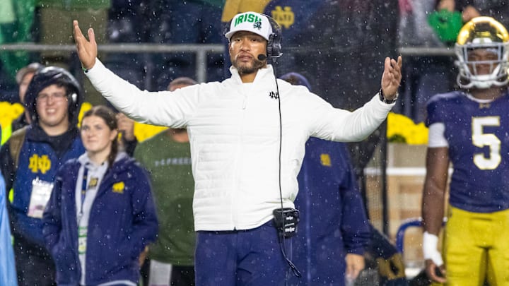 Oct 18, 2025; South Bend, Indiana, USA;  Notre Dame Fighting Irish head coach Marcus Freeman reacts to the play against the Southern California Trojans during the second half at Notre Dame Stadium. Mandatory Credit: Michael Caterina-Imagn Images