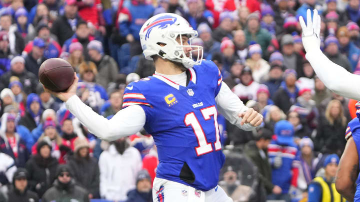 Dec 31, 2023; Orchard Park, New York, USA; Buffalo Bills quarterback Josh Allen (17) throws the ball against the New England Patriots during the first half at Highmark Stadium. Mandatory Credit: Gregory Fisher-USA TODAY Sports
