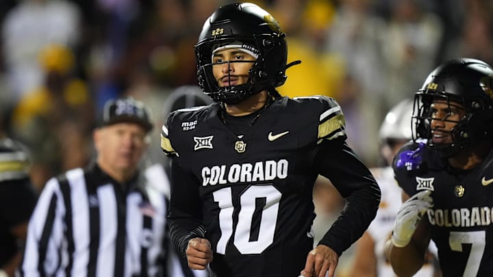 Nov 22, 2025; Boulder, Colorado, USA; Colorado Buffaloes quarterback Julian Lewis (10) following his third quarter touchdown against the Arizona State Sun Devils at Folsom Field. Mandatory Credit: Ron Chenoy-Imagn Images