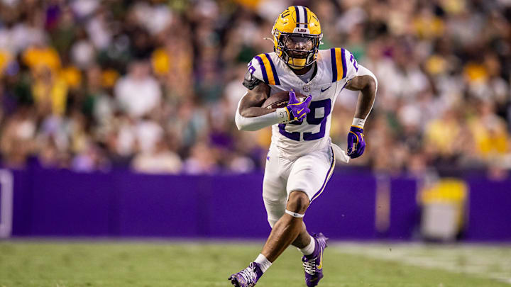 Sep 20, 2025; Baton Rouge, Louisiana, USA; LSU Tigers running back Caden Durham (29) runs against the Southeastern Louisiana Lions during the first half at Tiger Stadium. Mandatory Credit: Stephen Lew-Imagn Images Sep 20, 2025; Baton Rouge, Louisiana, USA; LSU Tigers running back Caden Durham (29) runs against the Southeastern Louisiana Lions during the first half at Tiger Stadium. Mandatory Credit: Stephen Lew-Imagn Images