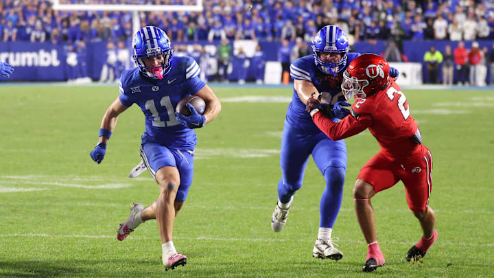 Oct 18, 2025; Provo, Utah, USA; BYU Cougars wide receiver Parker Kingston (11) runs for a touchdown against the Utah Utes during the second half at LaVell Edwards Stadium. Mandatory Credit: Rob Gray-Imagn Images Oct 18, 2025; Provo, Utah, USA; BYU Cougars wide receiver Parker Kingston (11) runs for a touchdown against the Utah Utes during the second half at LaVell Edwards Stadium. Mandatory Credit: Rob Gray-Imagn Images