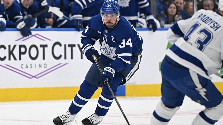 Mar 7, 2026; Toronto, Ontario, CAN;  Toronto Maple Leafs forward Auston Matthews (34) skates with the puck against the Tampa Bay Lightning in the first period at Scotiabank Arena. Mandatory Credit: Dan Hamilton-Imagn Images