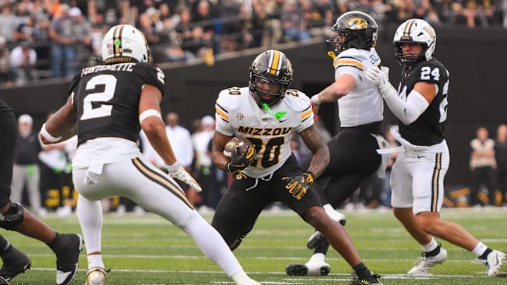 Oct 25, 2025; Nashville, Tennessee, USA; Missouri Tigers running back Jamal Roberts (20) runs with the ball against the Vanderbilt Commodores during the second half at FirstBank Stadium. Mandatory Credit: Steve Roberts-Imagn Images Oct 25, 2025; Nashville, Tennessee, USA; Missouri Tigers running back Jamal Roberts (20) runs with the ball against the Vanderbilt Commodores during the second half at FirstBank Stadium. Mandatory Credit: Steve Roberts-Imagn Images