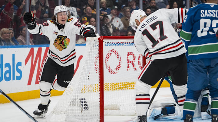 Nov 5, 2025; Vancouver, British Columbia, CAN; Chicago Blackhawks forward Nick Foligno (17) watches as forward Tyler Bertuzzi (59) celebrates his first goal of the third period against the Vancouver Canucks at Rogers Arena. Mandatory Credit: Bob Frid-Imagn Images Nov 5, 2025; Vancouver, British Columbia, CAN; Chicago Blackhawks forward Nick Foligno (17) watches as forward Tyler Bertuzzi (59) celebrates his first goal of the third period against the Vancouver Canucks at Rogers Arena. Mandatory Credit: Bob Frid-Imagn Images