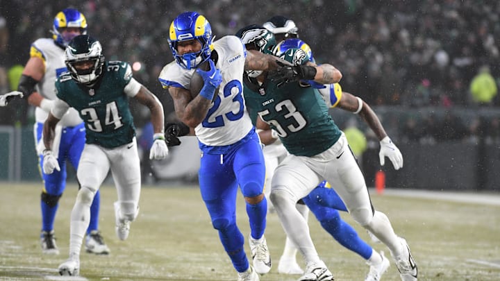 Jan 19, 2025; Philadelphia, Pennsylvania, USA; Los Angeles Rams running back Kyren Williams (23) runs past Philadelphia Eagles linebacker Zack Baun (53) during the third quarter against the Philadelphia Eagles in a 2025 NFC divisional round game at Lincoln Financial Field. Mandatory Credit: Eric Hartline-Imagn Images Jan 19, 2025; Philadelphia, Pennsylvania, USA; Los Angeles Rams running back Kyren Williams (23) runs past Philadelphia Eagles linebacker Zack Baun (53) during the third quarter against the Philadelphia Eagles in a 2025 NFC divisional round game at Lincoln Financial Field. Mandatory Credit: Eric Hartline-Imagn Images