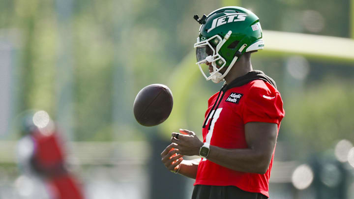 Jul 25, 2025; Florham Park, NJ, USA; New York Jets quarterback Justin Fields (7) looks on during a drill at training camp at Atlantic Health Jets Training Center. Mandatory Credit: John Jones-Imagn Images