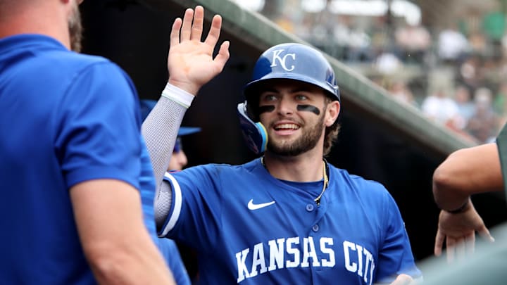 Sep 28, 2025; West Sacramento, California, USA; Kansas City Royals catcher Carter Jensen (22) is congratulated by teammates after scoring a run against the Athletics during the fifth inning at Sutter Health Park. Mandatory Credit: Dennis Lee-Imagn Images