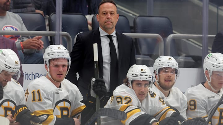 Nov 4, 2025; Elmont, New York, USA; Boston Bruins head coach Marco Sturm coaches against the New York Islanders during the first period at UBS Arena. Mandatory Credit: Brad Penner-Imagn Images Nov 4, 2025; Elmont, New York, USA; Boston Bruins head coach Marco Sturm coaches against the New York Islanders during the first period at UBS Arena. Mandatory Credit: Brad Penner-Imagn Images
