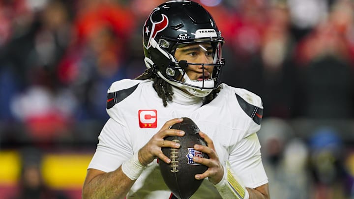 Houston Texans quarterback C.J. Stroud (7) drops back to pass during the second half against the Kansas City Chiefs in a 2025 AFC divisional round game at GEHA Field at Arrowhead Stadium.