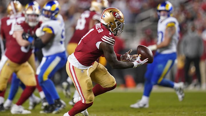 Dec 12, 2024; Santa Clara, California, USA; San Francisco 49ers wide receiver Deebo Samuel Sr. (1) drops the ball after attempting to make a catch against the Los Angeles Rams in the third quarter at Levi's Stadium. Mandatory Credit: Cary Edmondson-Imagn Images