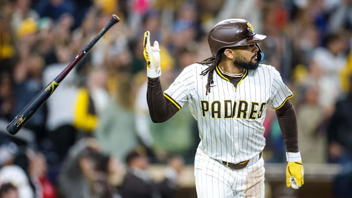 Apr 14, 2025; San Diego, California, USA;  San Diego Padres right fielder Fernando Tatis Jr. (23) flips his bat after hitting a two run home run during the eighth inning against the Chicago Cubs at Petco Park. Mandatory Credit: David Frerker-Imagn Images