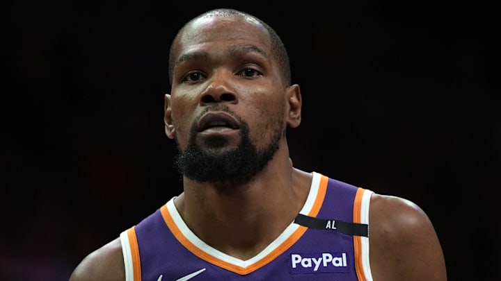 Mar 26, 2025; Phoenix, Arizona, USA; Phoenix Suns forward Kevin Durant (35) looks on against the Boston Celtics during the second half at Footprint Center. Mandatory Credit: Rick Scuteri-Imagn Images
