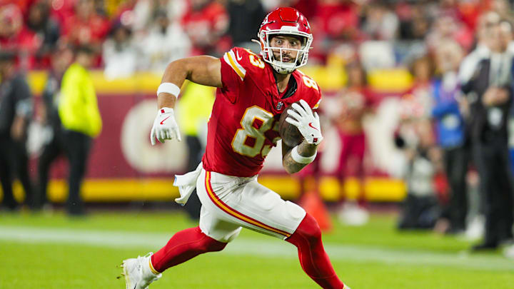Oct 7, 2024; Kansas City, Missouri, USA; Kansas City Chiefs tight end Noah Gray (83) runs with the ball during the second half against the New Orleans Saints at GEHA Field at Arrowhead Stadium. Mandatory Credit: Jay Biggerstaff-Imagn Images