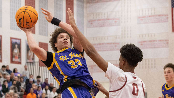 Jayden Hodge leans back to shoot past Rutgers Prep’s Myles Parker. St. Rose Boys Basketball vs Rutgers Prep in NJSIAA South Non-Public Final in Jackson, NJ on March 10, 2025.
