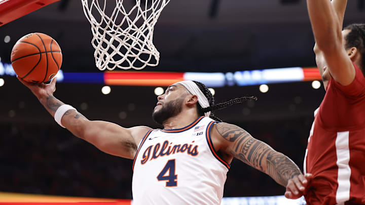Nov 19, 2025; Chicago, Illinois, USA; Illinois Fighting Illini guard Kylan Boswell (4) goes to the basket against Alabama Crimson Tide during the first half at United Center. Mandatory Credit: Kamil Krzaczynski-Imagn Images