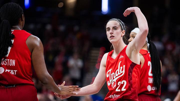 Aug 14, 2026; Indianapolis, Indiana, USA;  Indiana Fever guard Caitlin Clark (22) pumps up the crowd at a timeout in the second half against the Dallas Wings at Gainbridge Fieldhouse. Mandatory Credit: Trevor Ruszkowski-Imagn Images