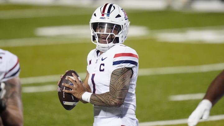 Nov 1, 2025; Boulder, Colorado, USA; Arizona Wildcats quarterback Noah Fifita (1) prepares to pass the ball in second quarter against the Colorado Buffaloes at Folsom Field. Mandatory Credit: Ron Chenoy-Imagn Images