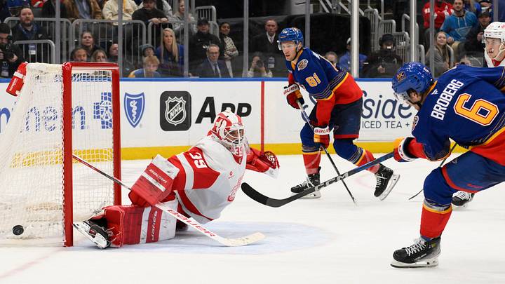 Apr 1, 2025; St. Louis, Missouri, USA; Detroit Red Wings goaltender Cam Talbot (39) defends the net from St. Louis Blues defenseman Philip Broberg (6) and center Dylan Holloway (81) during overtime at Enterprise Center. Mandatory Credit: Jeff Le-Imagn Images Apr 1, 2025; St. Louis, Missouri, USA; Detroit Red Wings goaltender Cam Talbot (39) defends the net from St. Louis Blues defenseman Philip Broberg (6) and center Dylan Holloway (81) during overtime at Enterprise Center. Mandatory Credit: Jeff Le-Imagn Images