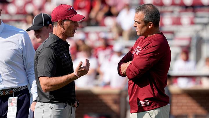 Oklahoma coach Brent Venables chats with Shane Beamer before a contest. Oklahoma coach Brent Venables chats with Shane Beamer before a contest.