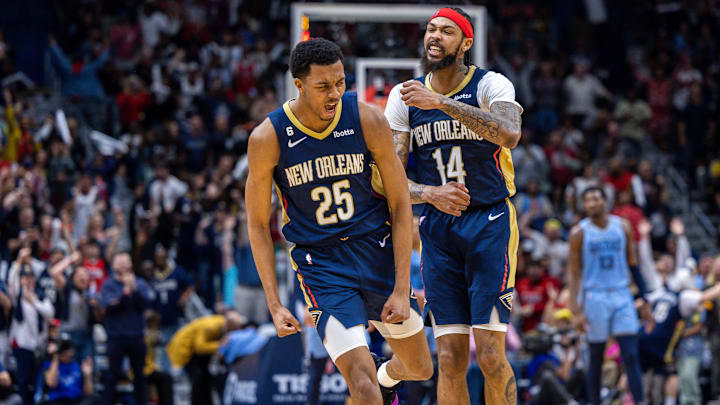 Apr 5, 2023; New Orleans, Louisiana, USA;  New Orleans Pelicans guard Trey Murphy III (25) reacts to making a three point basket with forward Brandon Ingram (14) against the Memphis Grizzlies during the second half at Smoothie King Center.