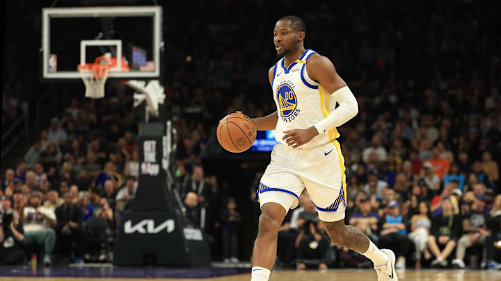 Apr 8, 2025; Phoenix, Arizona, USA; Golden State Warriors forward Jonathan Kuminga (00) against the Phoenix Suns at Footprint Center. Mandatory Credit: Mark J. Rebilas-Imagn Images Apr 8, 2025; Phoenix, Arizona, USA; Golden State Warriors forward Jonathan Kuminga (00) against the Phoenix Suns at Footprint Center. Mandatory Credit: Mark J. Rebilas-Imagn Images